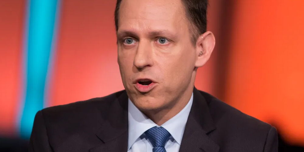 A photo of Peter Thiel at the PayPal headquarters, representing his role as a co-founder of the company